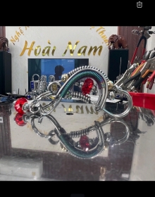Móc khóa hình chữ tâm thư pháp có ngọc đỏ  goi là tâm ngọc .đem lại sức khỏe  phước lành bình an cho bản chủ